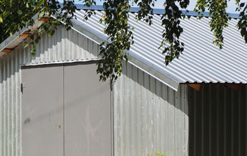 repairing Tre Mostyn metal garage roofing